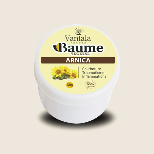 Arnica Balm from Madagascar | Vaniala – jar of plant balm on beige background
