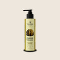 Décontract Katrafay from Madagascar | Vaniala – bottle of massage oil on beige background