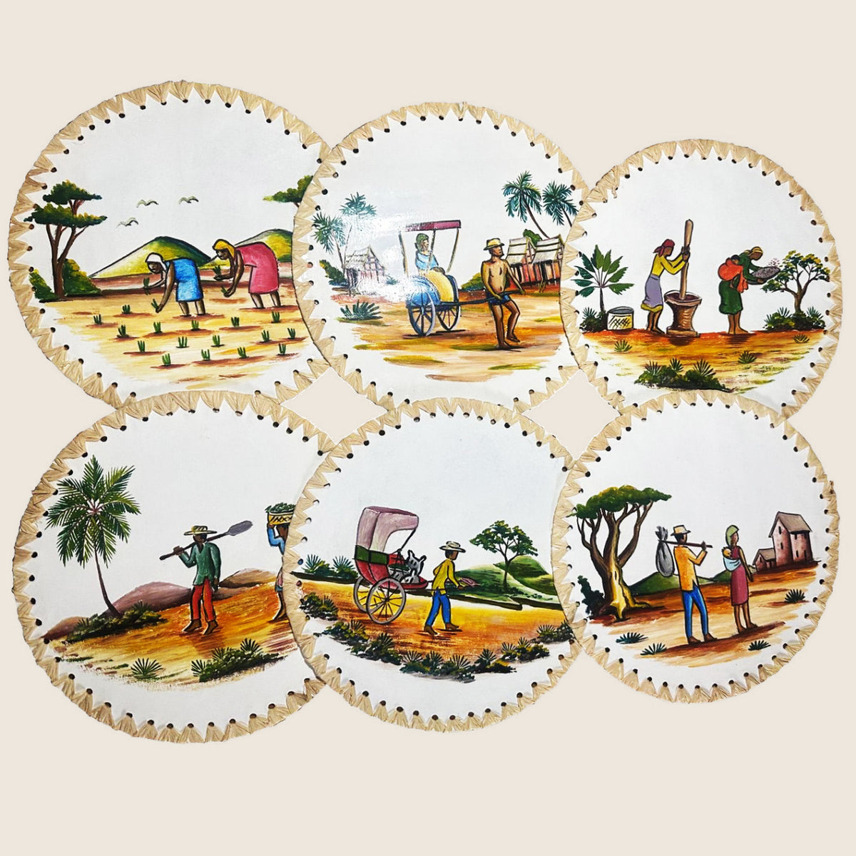 Enamel Under Plates from Madagascar | Art'Jo Deco – six painted under plates with braided raffia edging