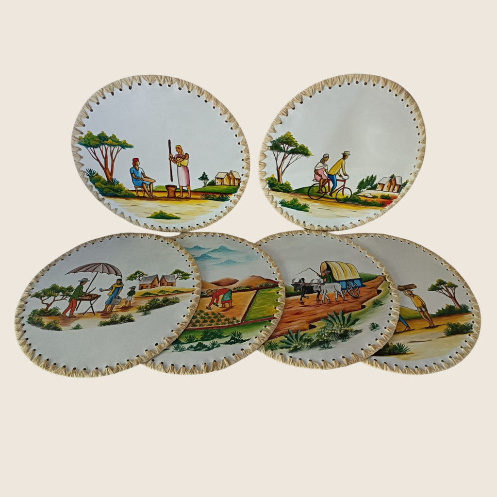 Enamel Under Plates from Madagascar | Art'Jo Deco – the under plates arranged showing different scenes