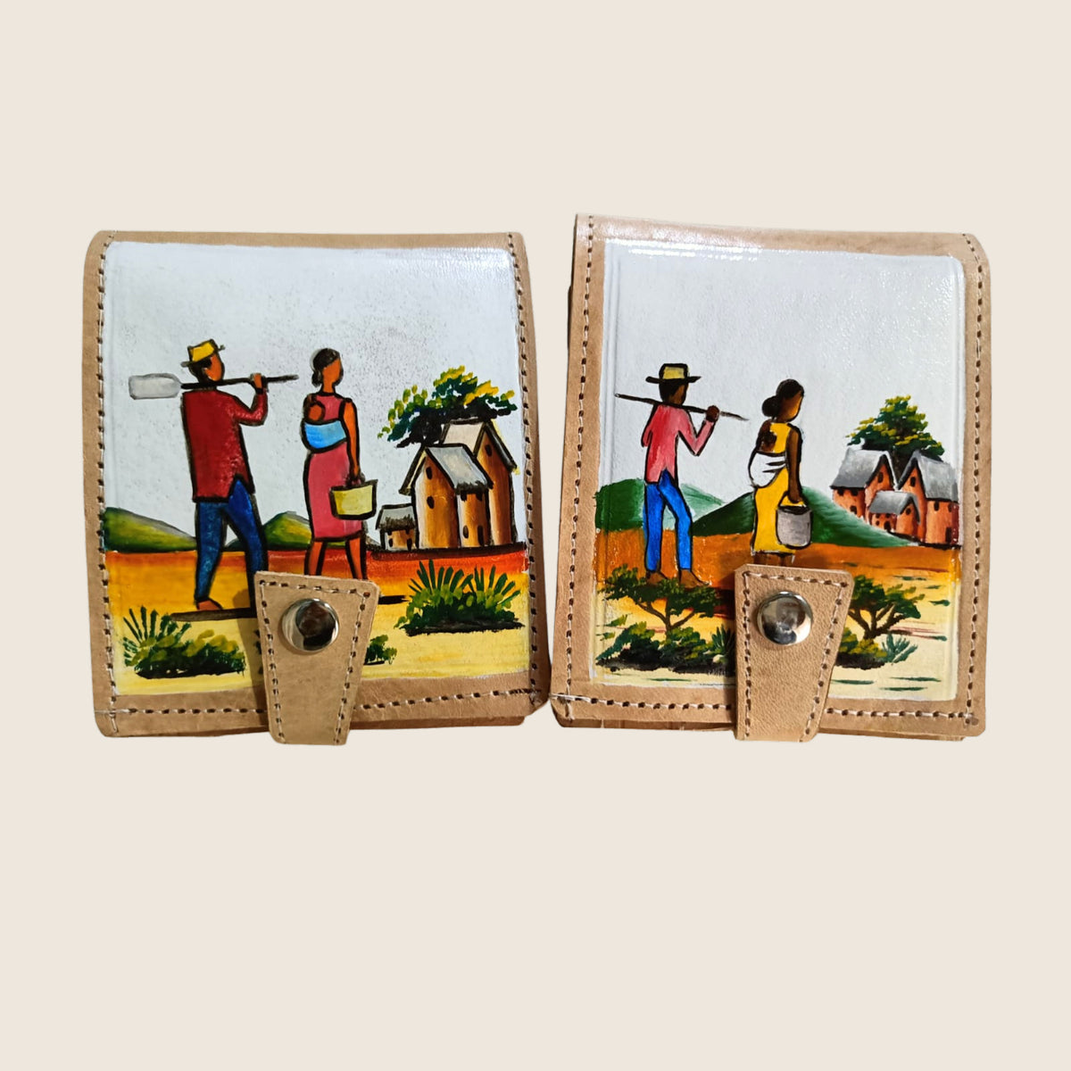 Men's Painted Wallet from Madagascar | Art'Jo Deco – two painted leather wallets side by side