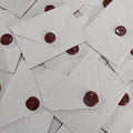 Wax Seal Envelopes from Madagascar | B Miray – Antemoro paper envelopes closed with dark red wax seals