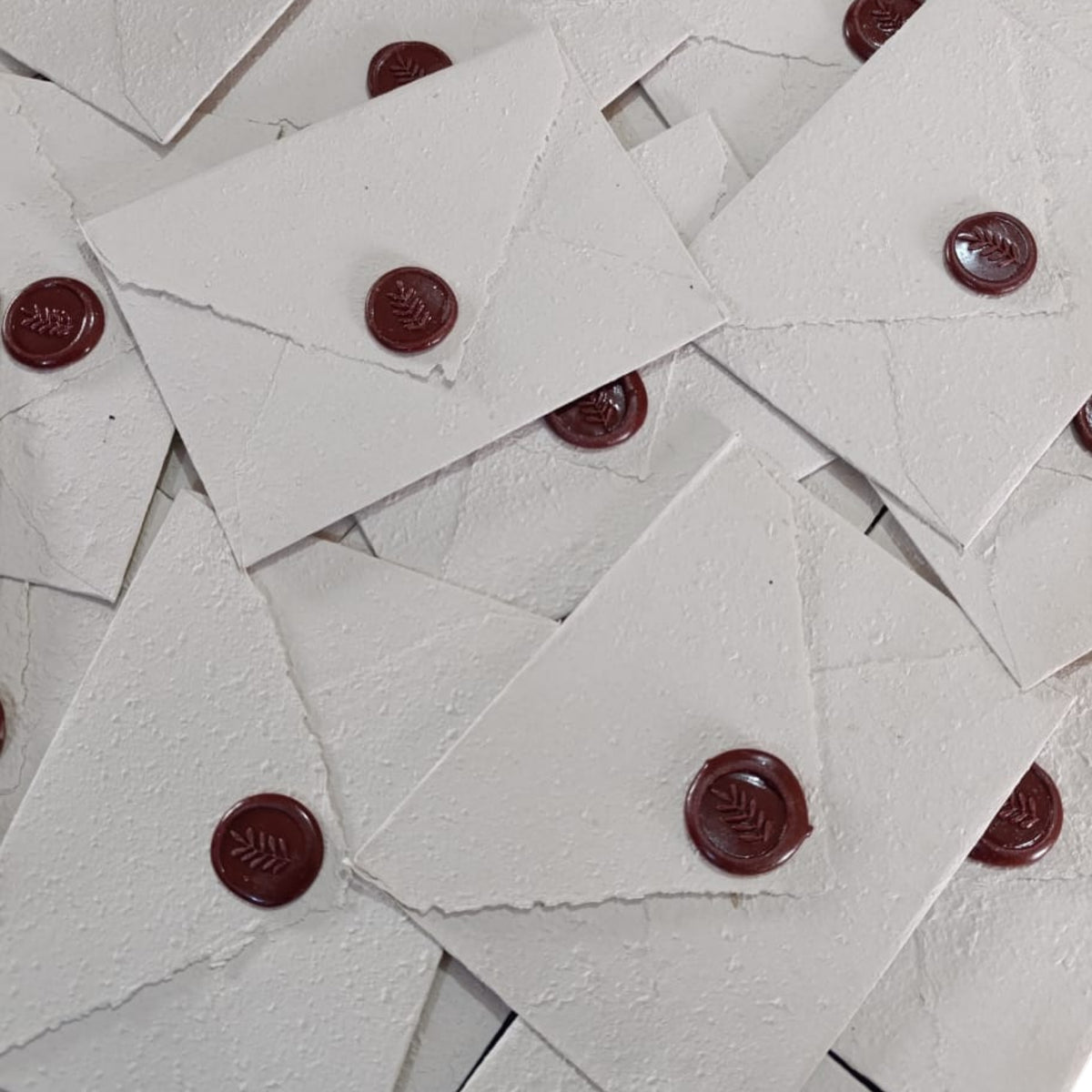Wax Seal Envelopes from Madagascar | B Miray – Antemoro paper envelopes closed with dark red wax seals