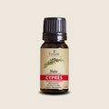 Cypress Essential Oil from Madagascar | Vaniala – essential oil bottle on beige background