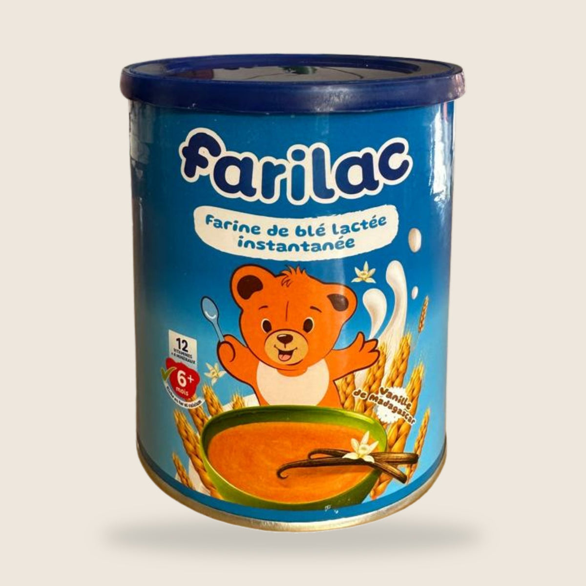 Vanilla Baby Cereal from Madagascar | Farilac – 400 g can on beige background