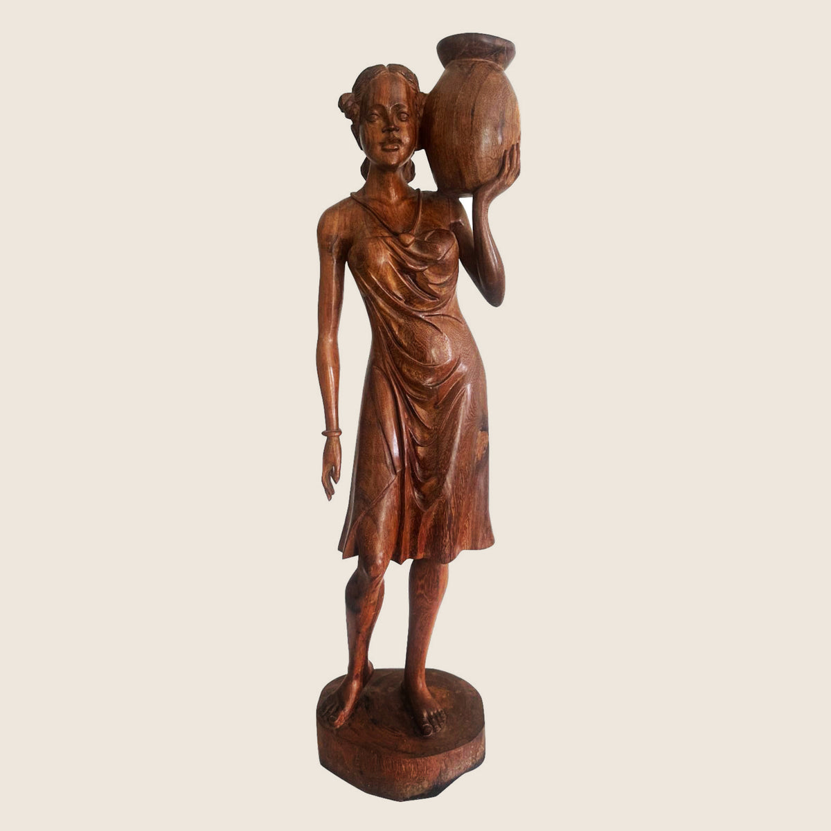Water Bucket Statuette from Madagascar | Gasy k'Arts – carved wooden statuette of a woman carrying a bucket