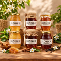 Eucalyptus Honey from Madagascar | Ilonka – Ilonka honey range with flowers on a wooden table