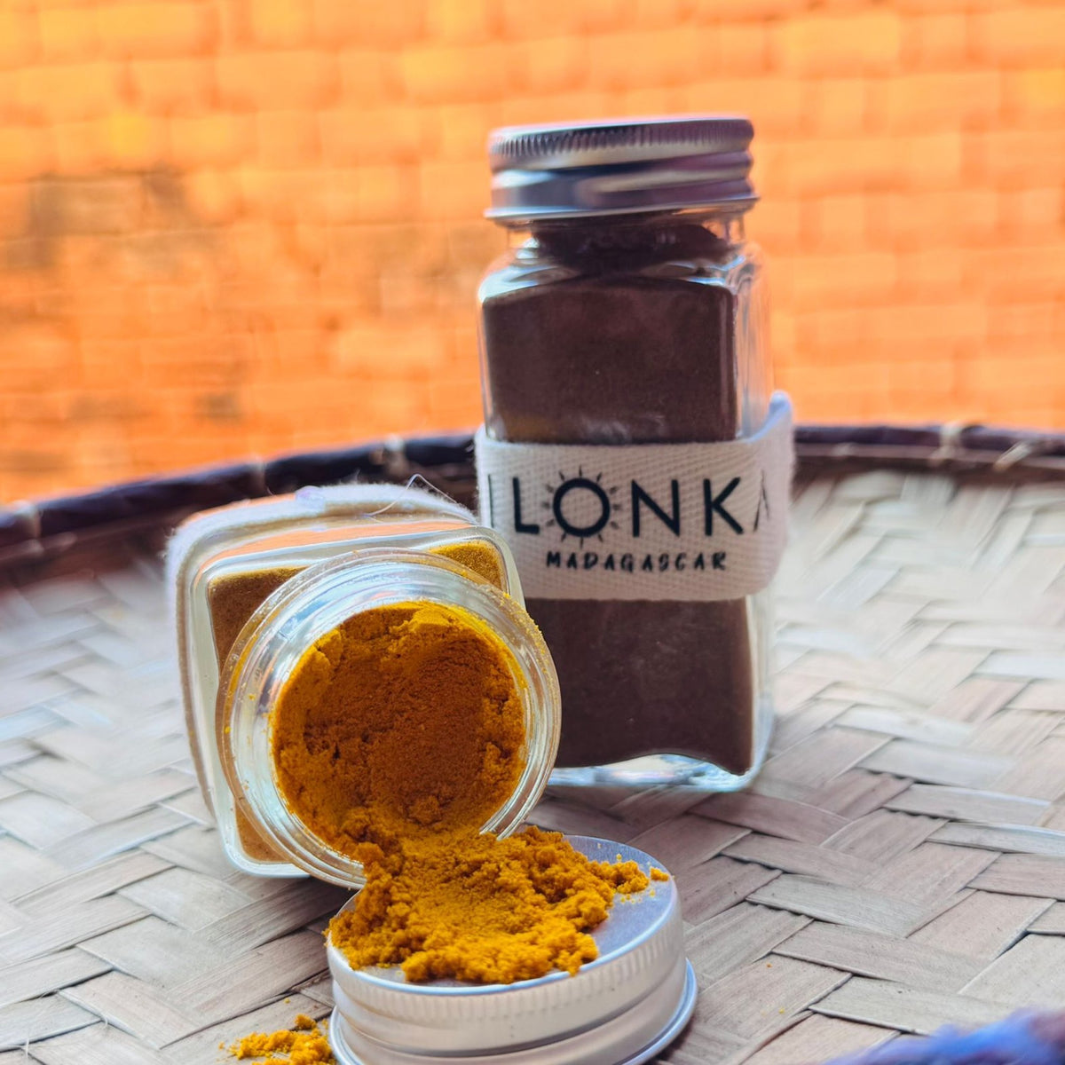 Turmeric Powder from Madagascar | Ilonka – open jar of golden turmeric on a woven tray