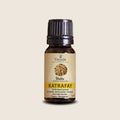 Katrafay Essential Oil from Madagascar | Vaniala – essential oil bottle on beige background
