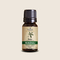 Niaouli Essential Oil from Madagascar | Vaniala – essential oil bottle on beige background