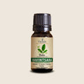 Ravintsara Essential Oil from Madagascar | Vaniala – essential oil bottle on beige background