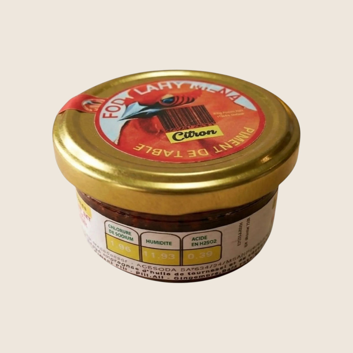 Lemon Chili from Madagascar | Sakay Fody Lahy Mena – jar of lemon table chili on beige background