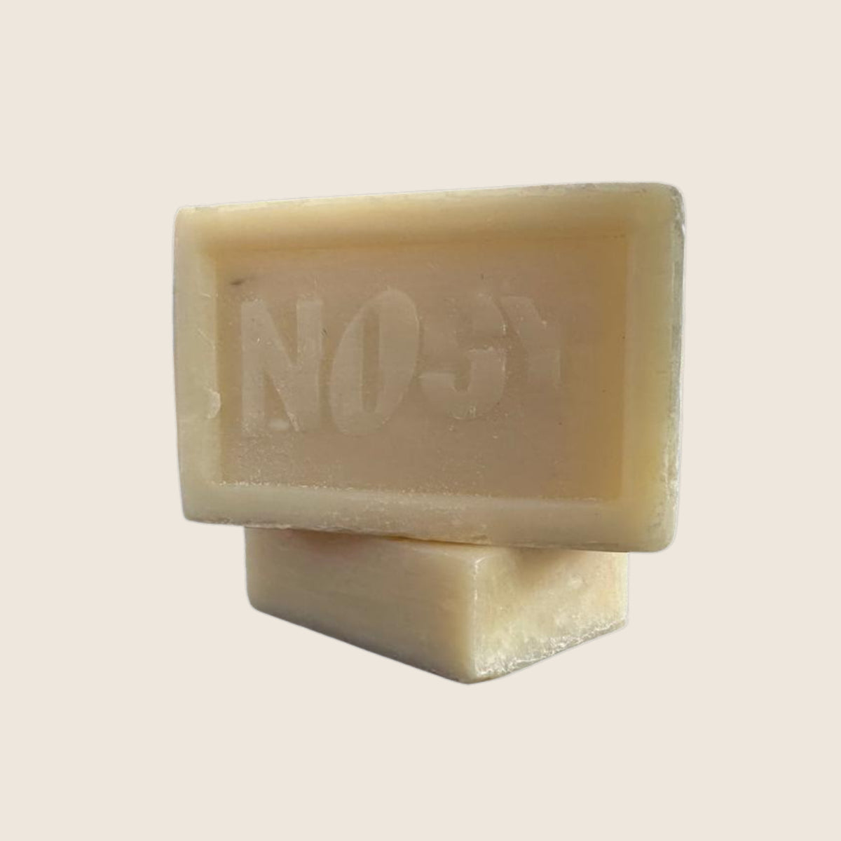 Nosy Block Soap from Madagascar | Savonnerie Tropicale – two unwrapped Nosy soap blocks stacked