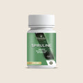 Spirulina Capsules from Madagascar | Vaniala – bottle of capsules on beige background